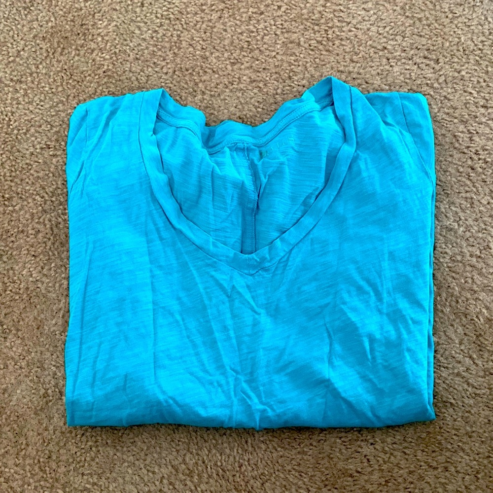 Teal colored tshirt size L
